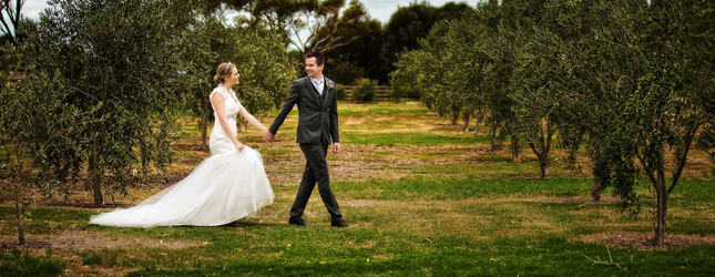 Newly wed couple at garden venue of Seasons5