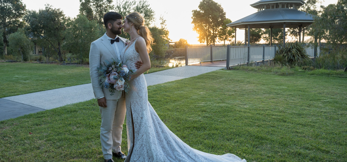 Beautiful couple in front of Seasons5's Gazebo wedding venue in Melbourne